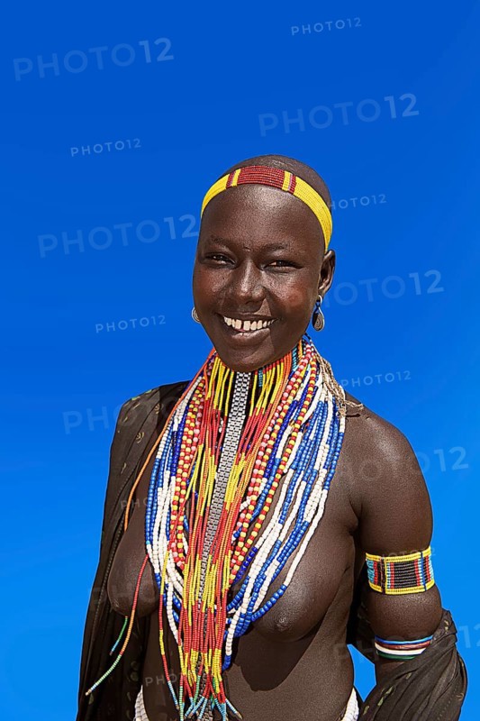 Woman with many pearl necklaces as necklace