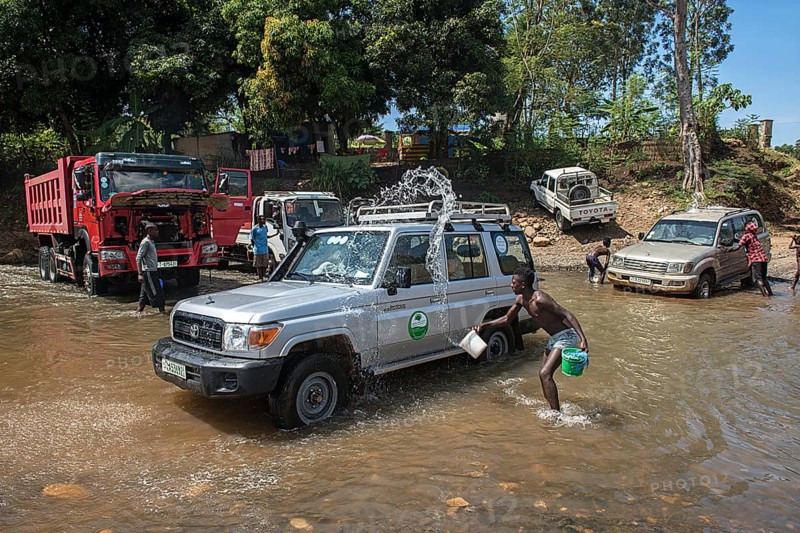Cars are washed in the river
