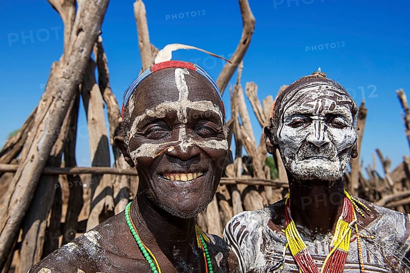 Old men of the tribe of the Karo with face painting
