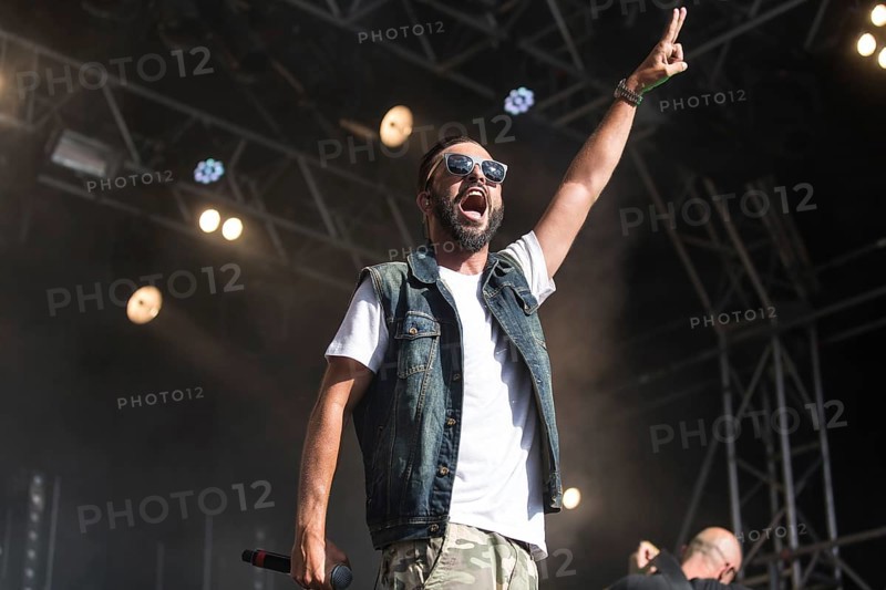 The swiss rapper and musician Marco Bliggensdorfer alias Bligg live at the 26th Heitere Open Air in Zofingen