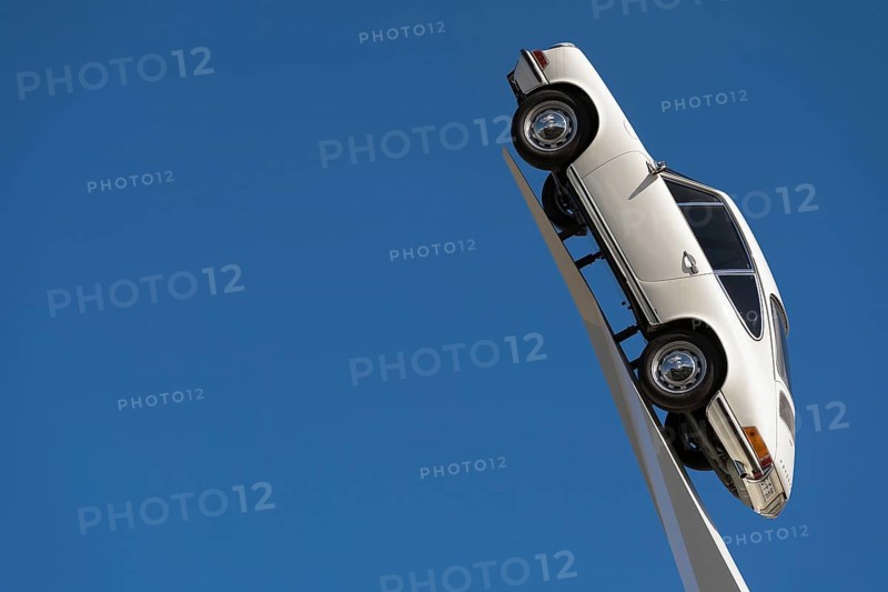 911 F-model from 1970 on a white pedestal