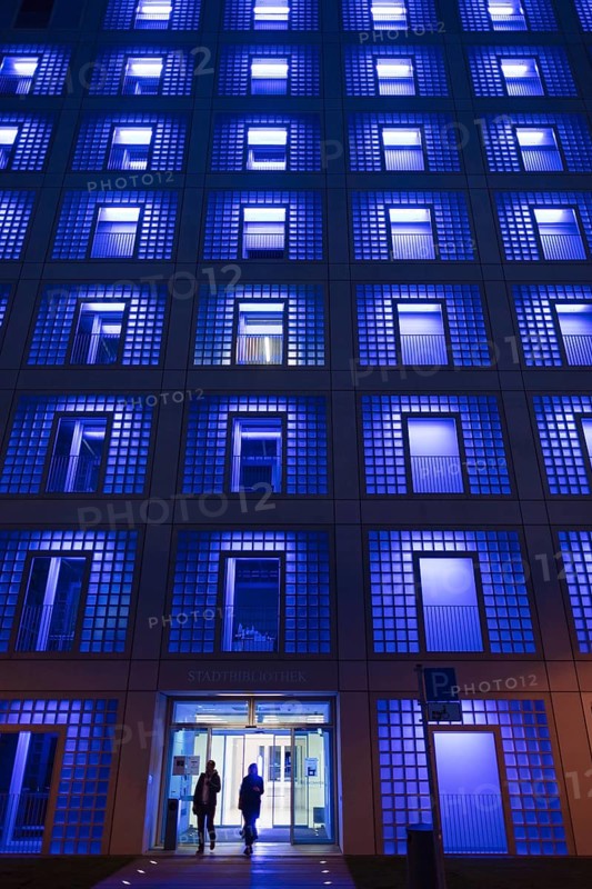 Illuminated city library at night
