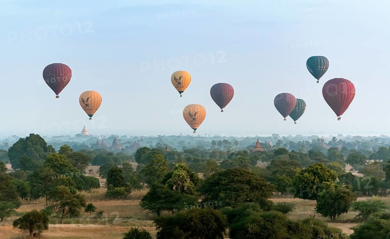 Hot-air Balloons in flight over temples