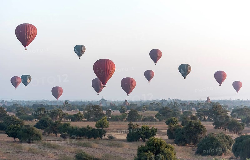 Hot-air Balloons in flight over temples