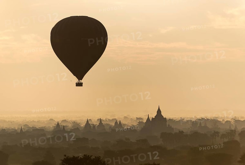 Hot-air Balloon in flight over temples of Bagan