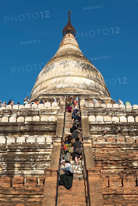 Visitors climb steep steps of Shwesandaw Pagoda