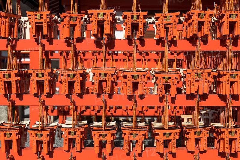 Ema wish plaques in the shape of orange torii gate