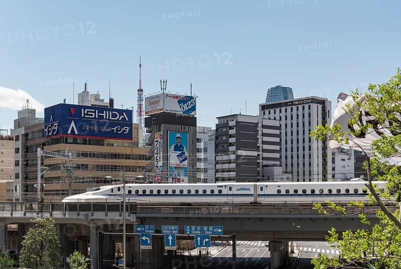 Shinkansen bullet train on a bridge in Shiodome