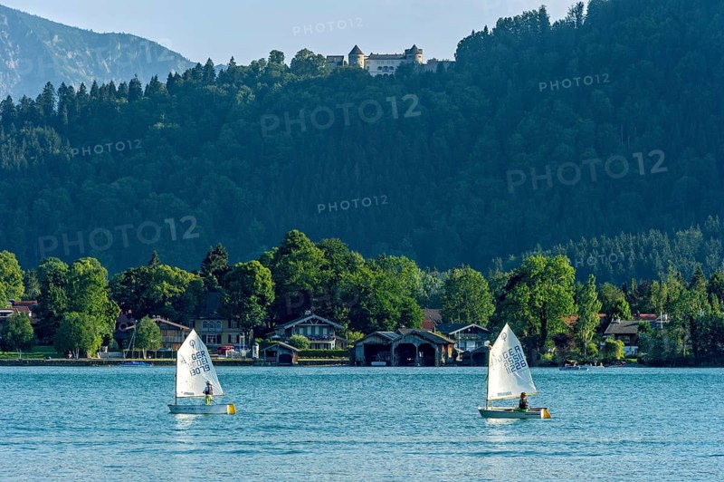 Regatta with children in sailing boats