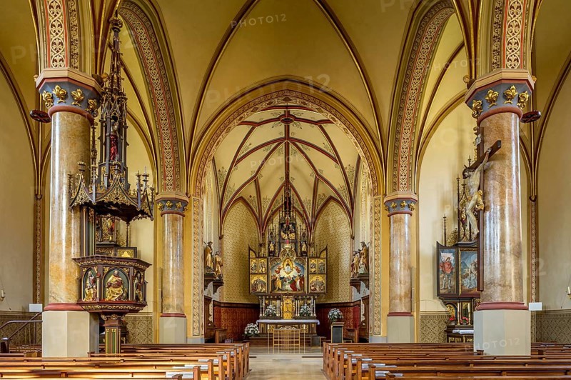 Interior with pulpit and choir of the neo-Gothic parish church of the Assumption