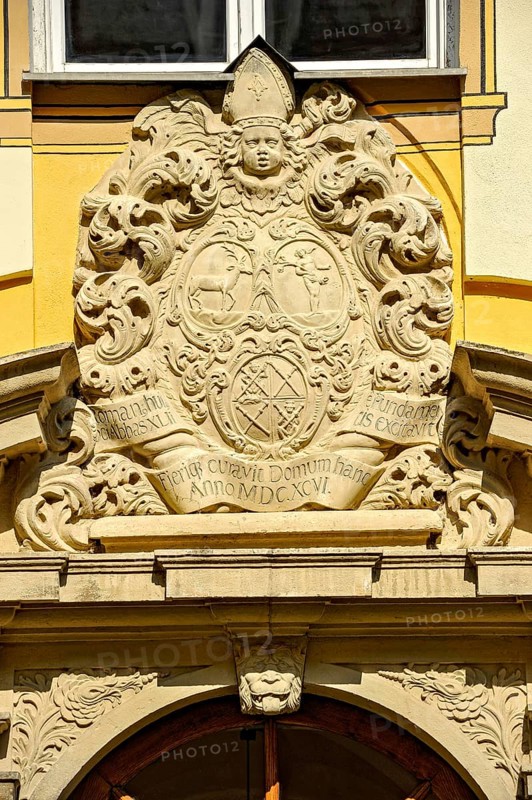 Baroque coat of arms over monastery gate