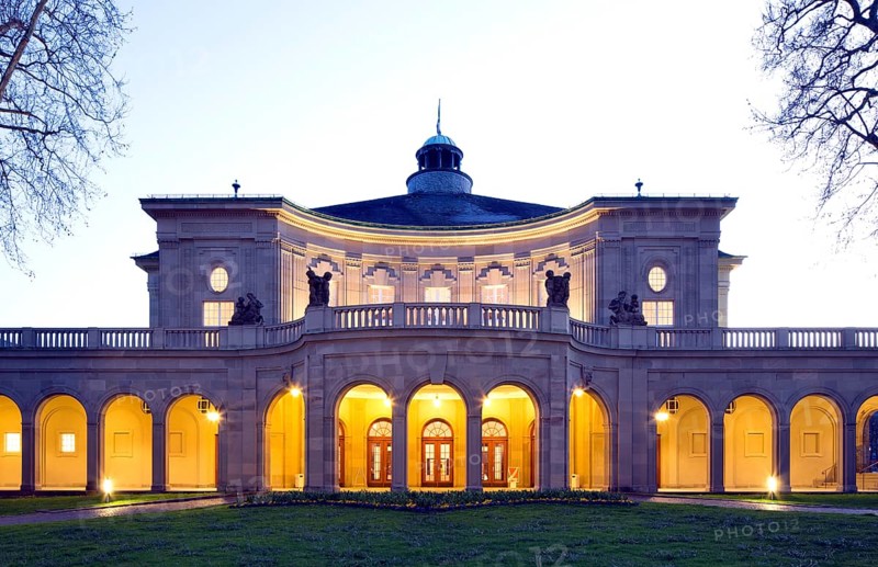 Illuminated Kursaal building or Regentenbau at dusk