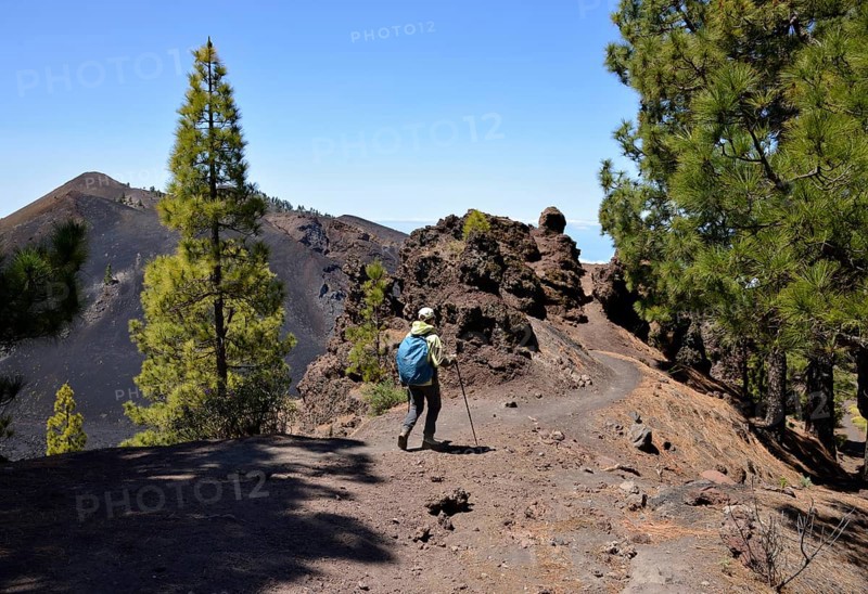 Female hiker in front of volcano Duraznero