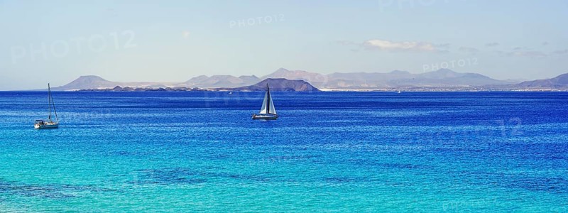 Sailboats in turquoise waters
