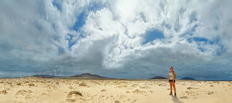 Young woman in the sand dunes at Morros Negros