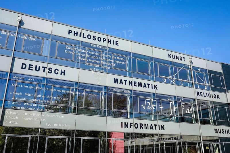 Glass facade with quotations and formulas