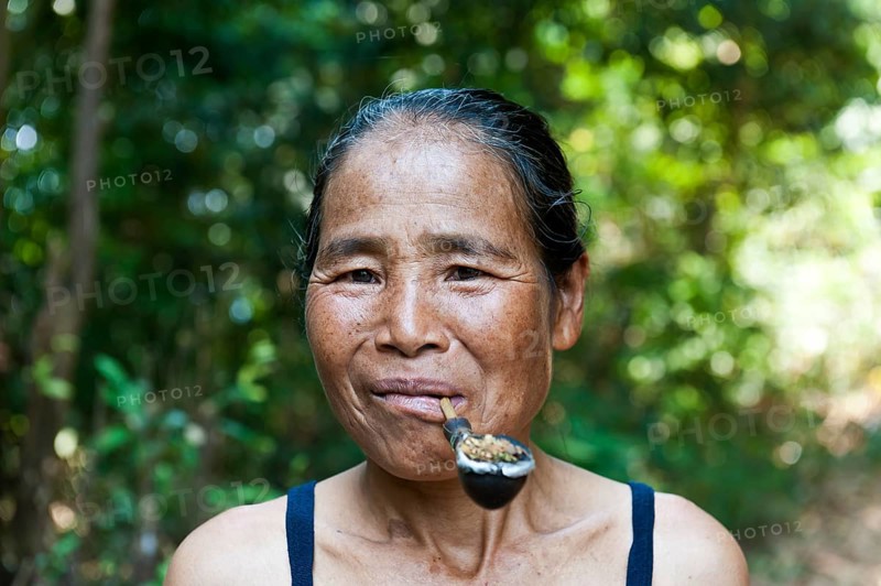 Woman with pipe in mouth