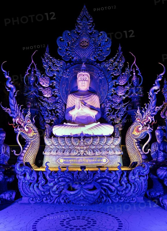 Blue Buddha Statue in the Garden of Wat Rong Seur Ten