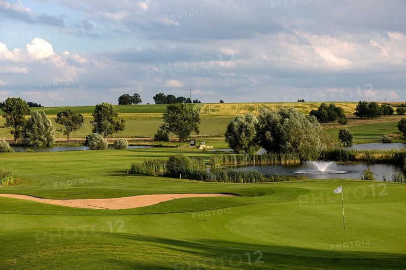 Golf course with water obstacle