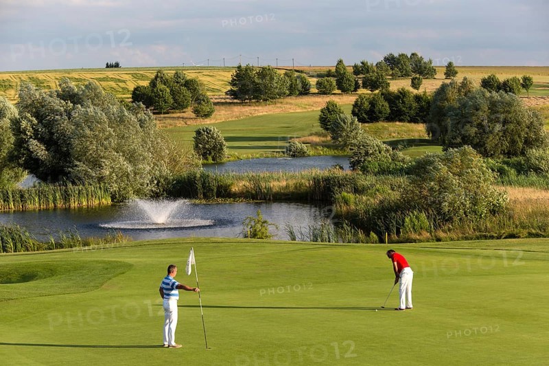 Golf player putting
