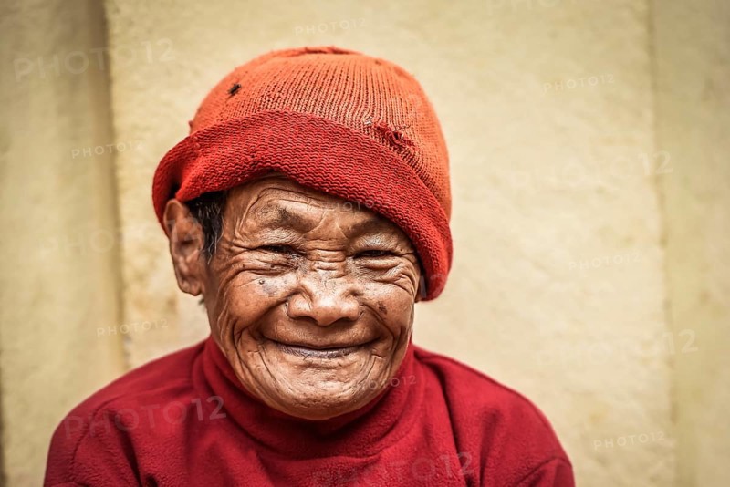 Laughing woman with cap