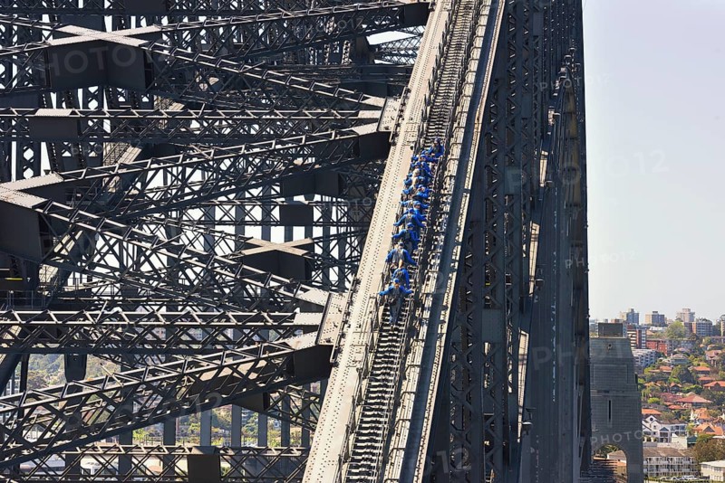 People walking on Sydney Harbor Bridge