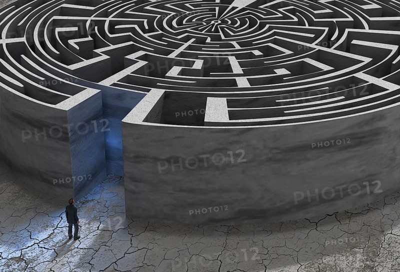 Man in front of labyrinth