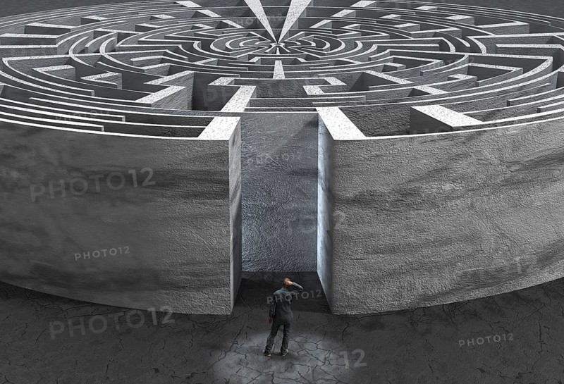 Man in front of labyrinth