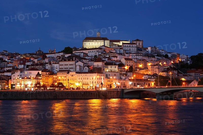 Historic centre with University and Mondego River at dusk