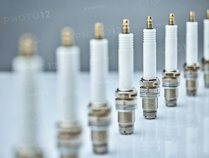 Spark plugs standing in a row