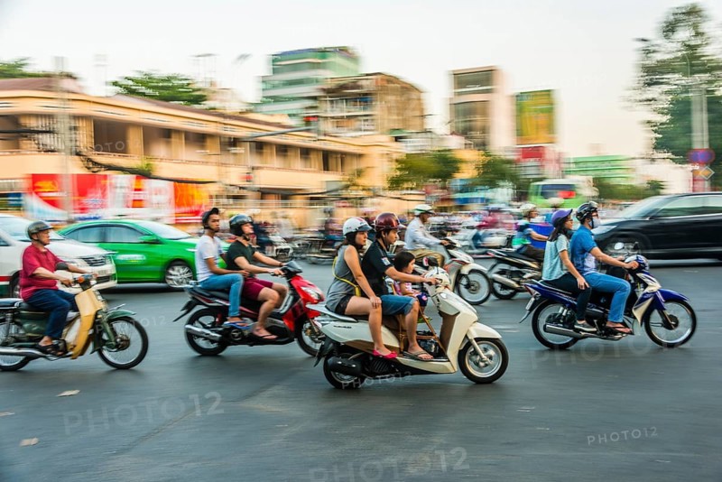 Scooter drivers in heavy traffic