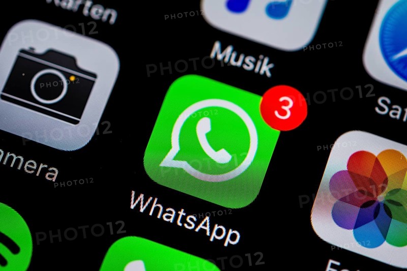 Smartphone screen with WhatsApp icon