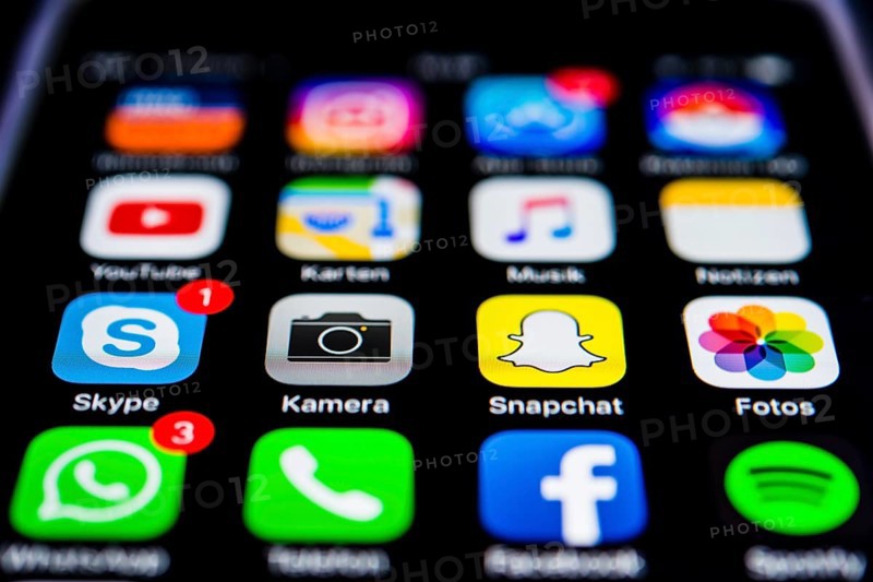IPhone screen displaying multiple app icons