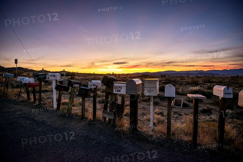 Roadside mailboxes at sunset