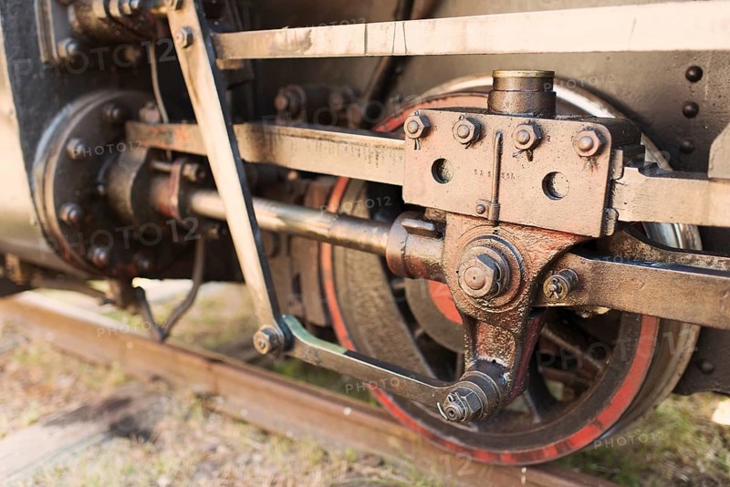 Close up of wheel on old steam train locomotive