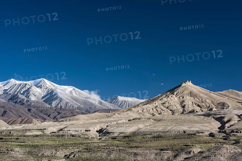 Snowy mountains and ruin
