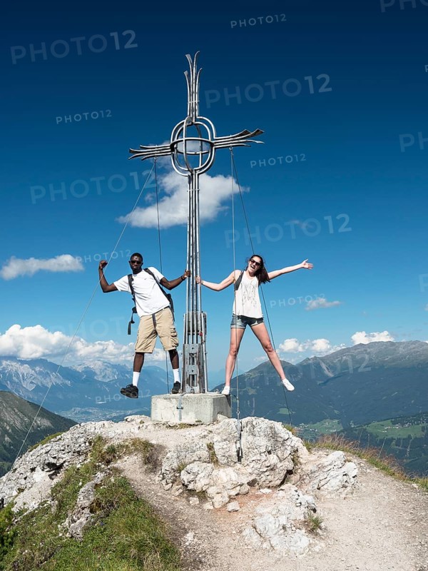 Couple at the summit cross