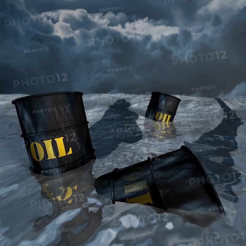 Oil barrels floating in the sea
