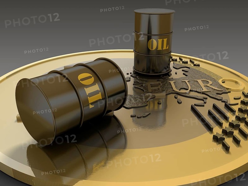 Two oil barrels on euro coin