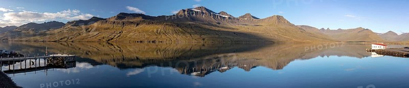 Mountain landscape reflected in Faskruosfjorour
