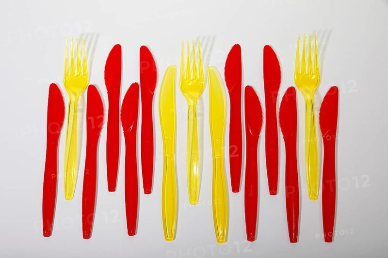 Red and yellow plastic cutlery