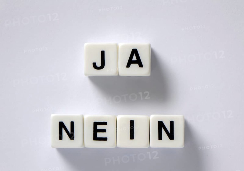 Dice with yes and no lettering
