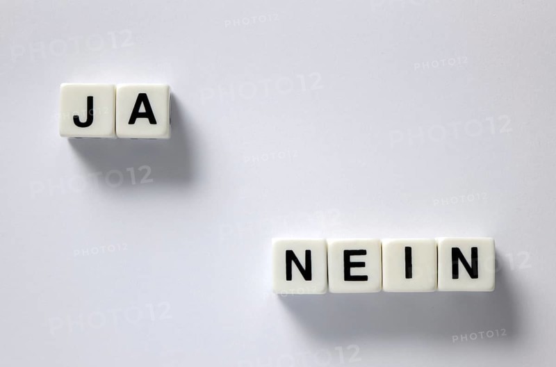 Dice with yes and no lettering