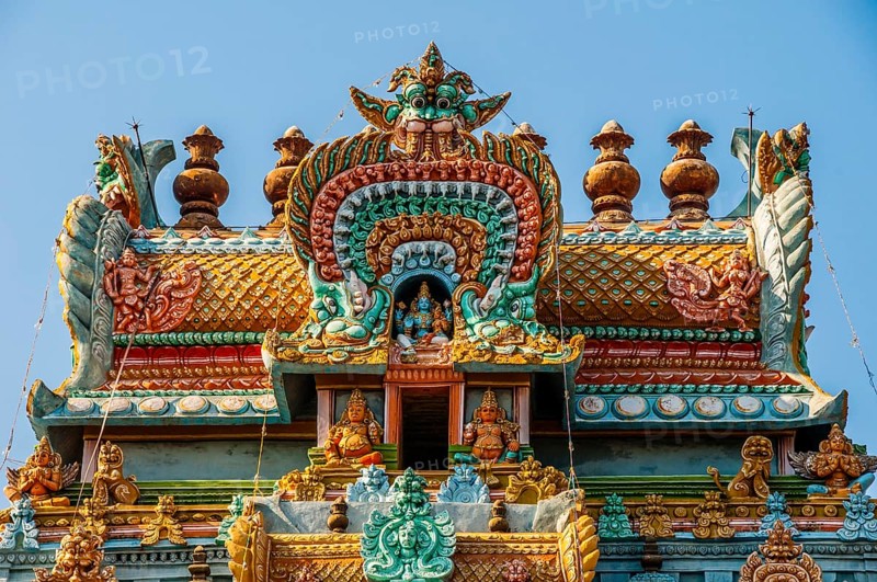Colorful and decorated Hindu temple with idols of Hindu worship