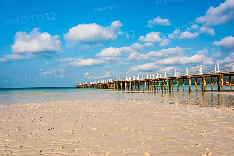 Pier on beach with turquoise water at Saracen Bay on Koh Rong Sanloem island