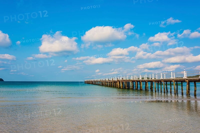 Pier on beach with turquoise water at Saracen Bay on Koh Rong Sanloem island