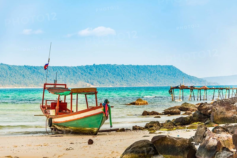 Idyllic sandy beach with traditional long-tail boat at Long Beach