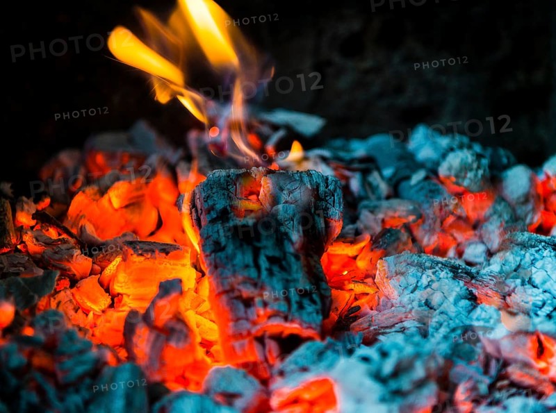Charcoal and flames