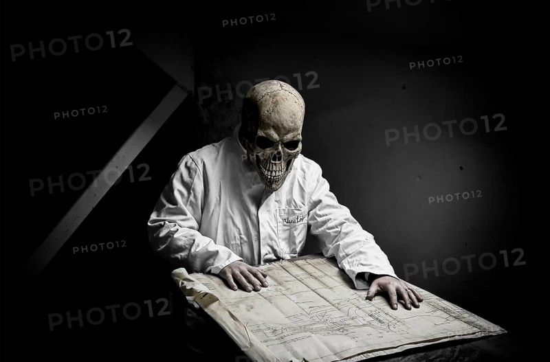 The doctor of death studying his method of destruction