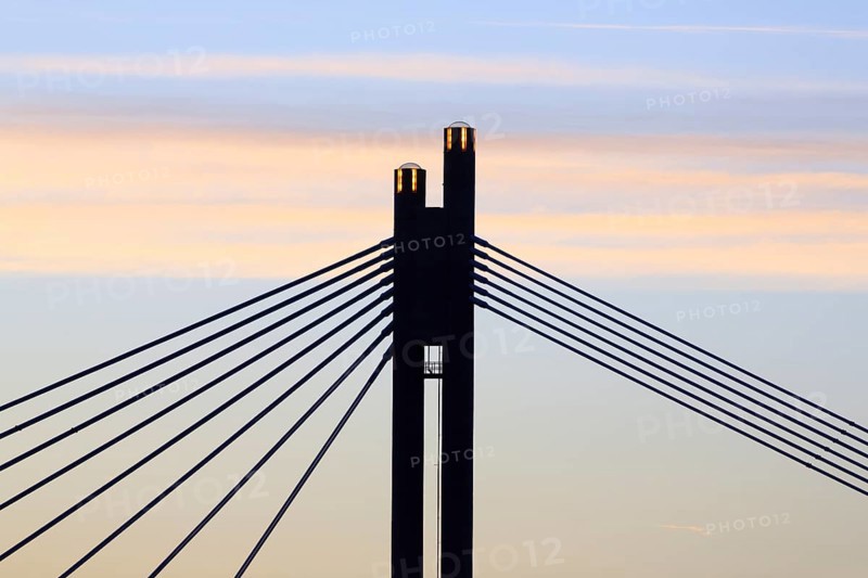 Eternal fire lit in the pylons of Jatkankynttilasilta bridge or Lumberjack Candle Bridge